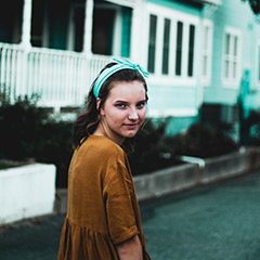 moody senior portrait with vibrant color