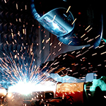 Our welder precision stick welding some structual steel parts.