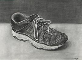 A black and white charcoal drawing of a tennis shoe.