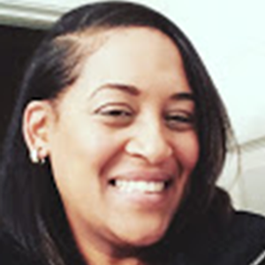 a portrait of Tessa smiling