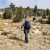 hikers traveling toward Pyramid Peak