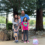Image of family of 5 people
