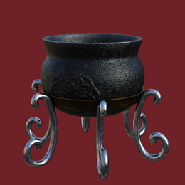 a small black cauldron with a red background