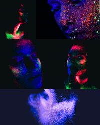 faces covered in paint with glowlight reflections