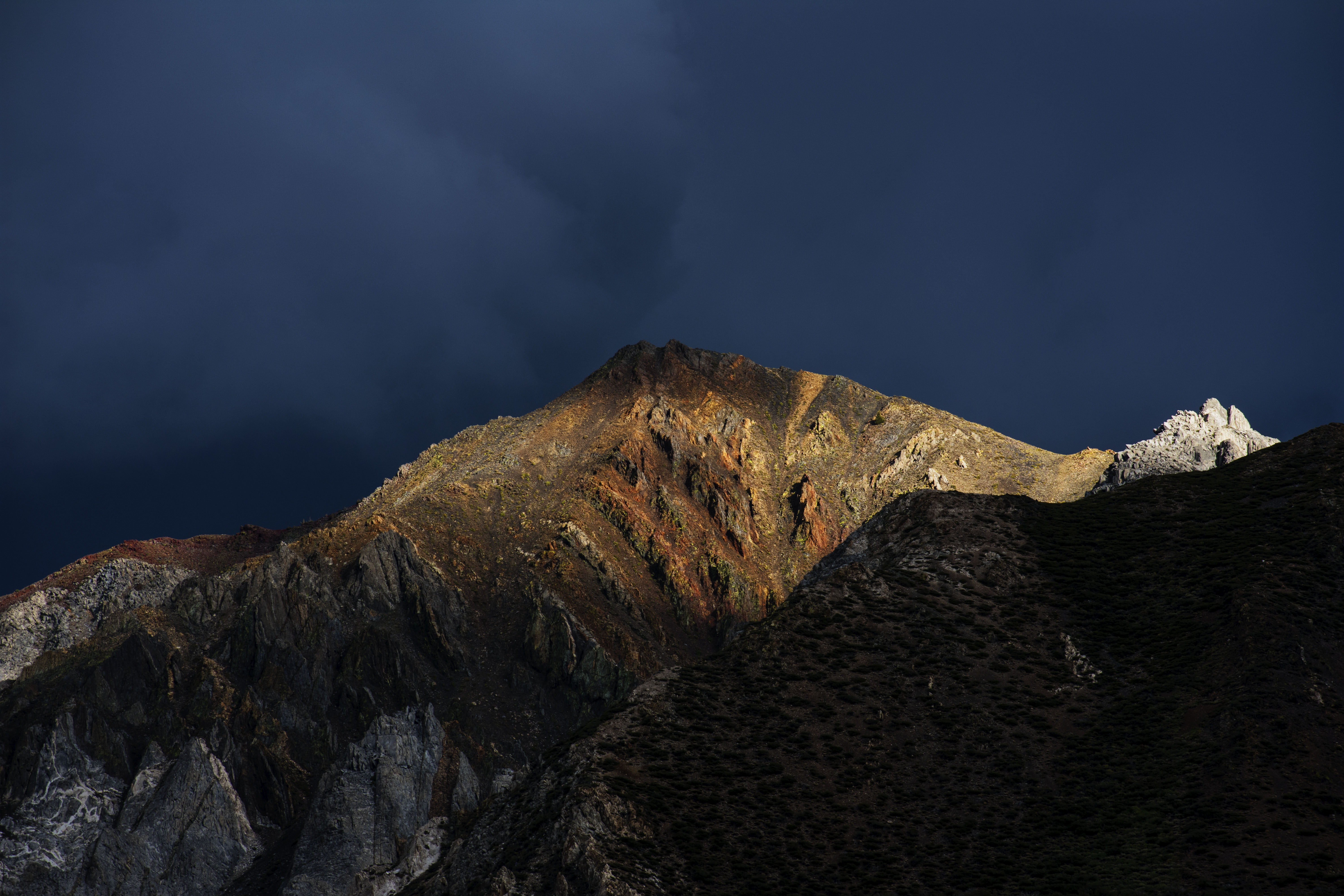 Ray of light on a jagged mountain