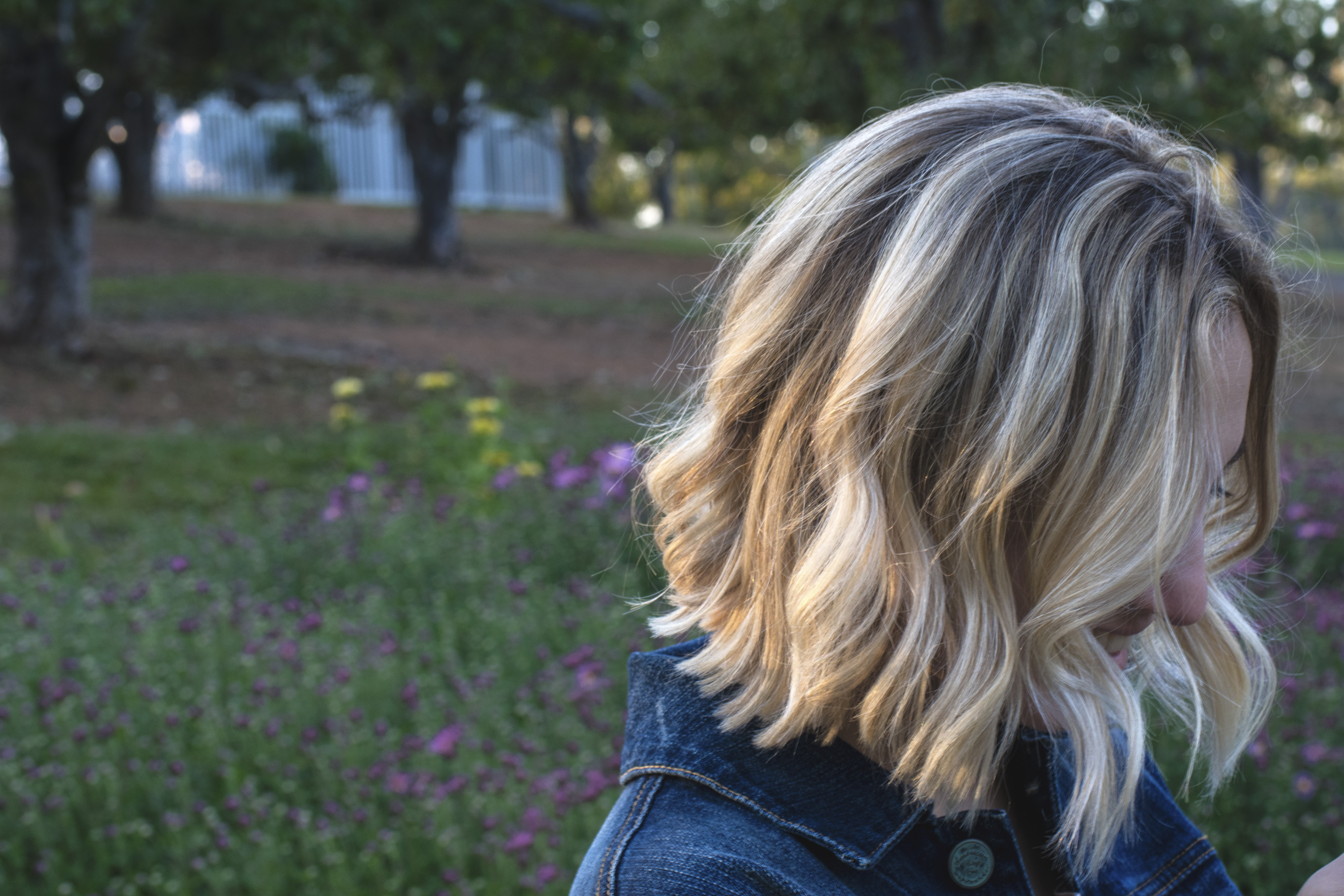 Blonde woman's hair at sunset