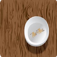 Mister and Missus ring bowl sittng on a wooden table