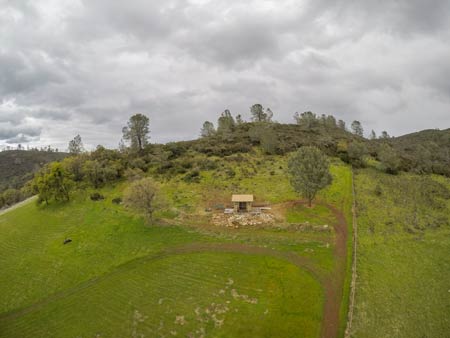 a tiny house on a hill