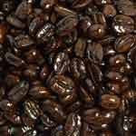Image of Dark roast whole coffee beans.